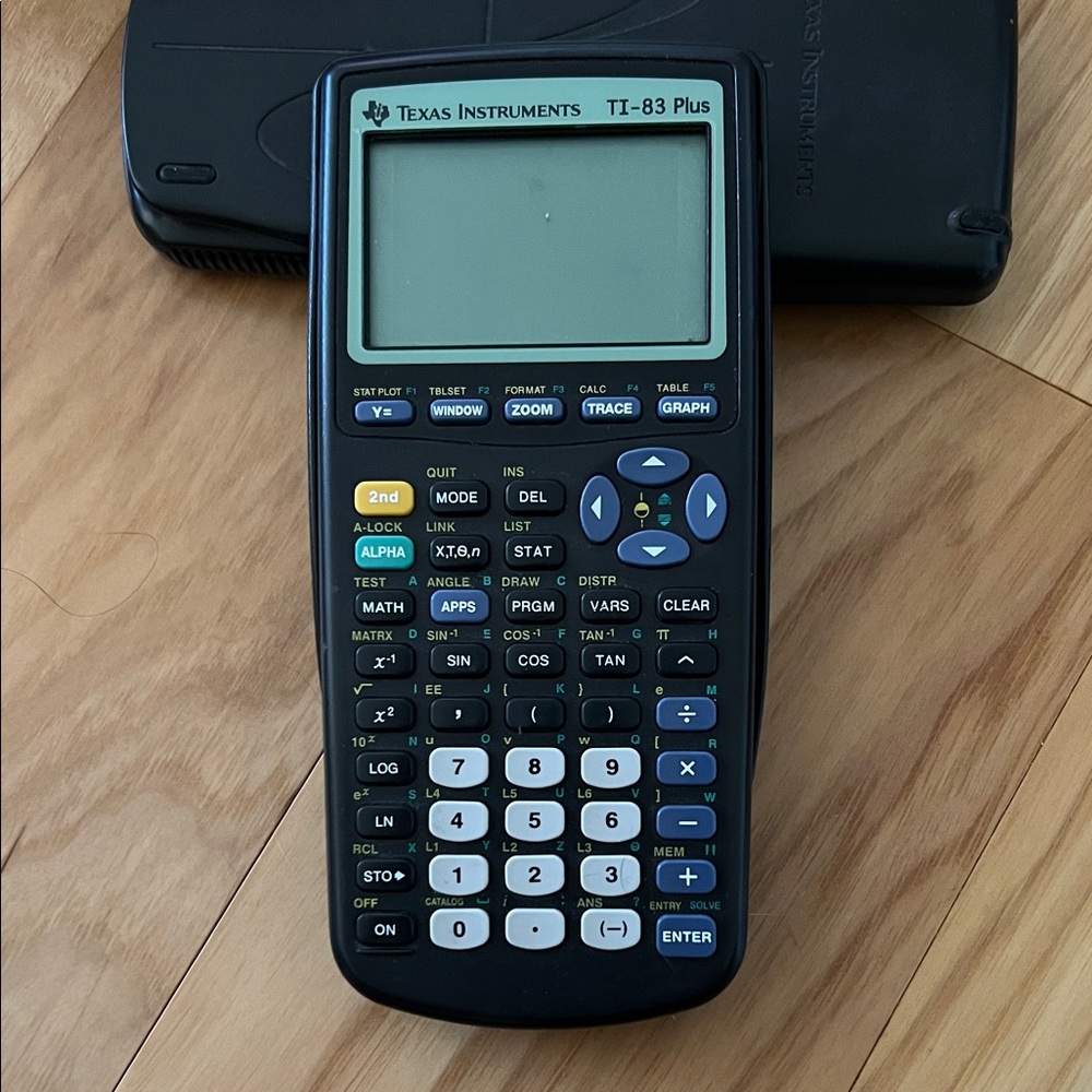 Texas Instruments TI-83 Plus with Blue and White Keypad